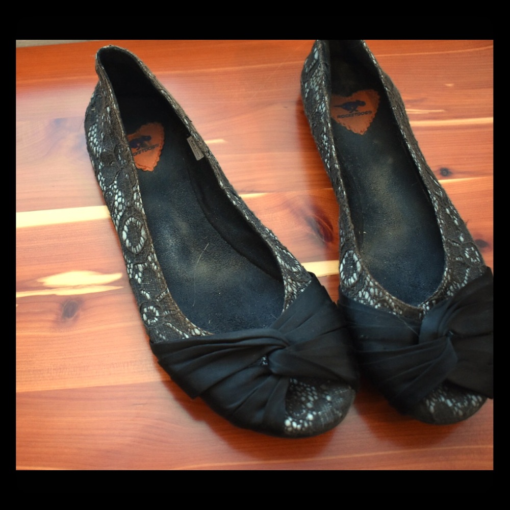 Lace-covered Rocket Dog flats